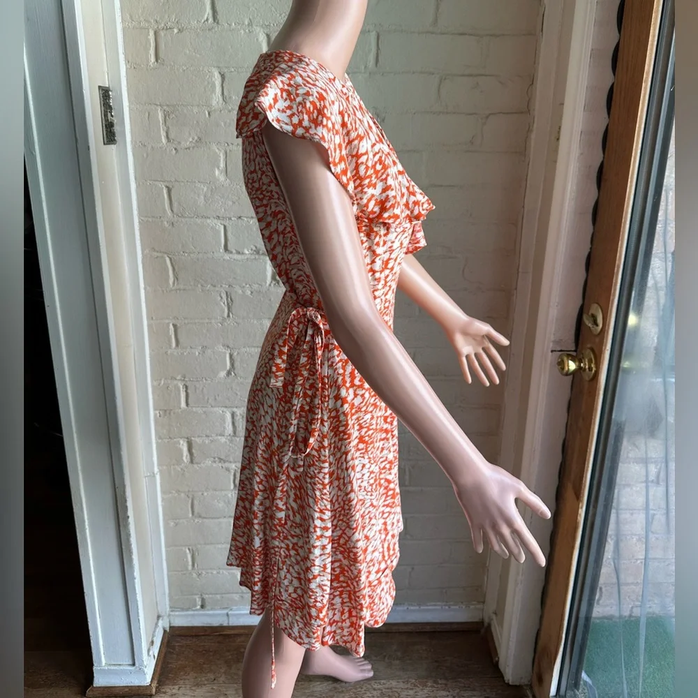 Free People size small white orange and tan animal print cute summer wrap dress